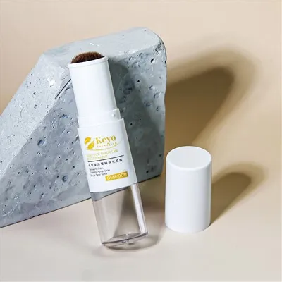 Recipiente de pó solto com pincel